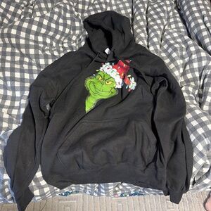 Festive Black Hoodie with Grinch Design